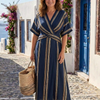 Begoña | Vestido midi envolvente a rayas con cuello en V y mangas cortas