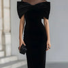 Belén | Vestido midi de terciopelo negro con lazo