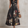 Patricia | Vestido Midi de Satén Negro con Estampado Floral y Pliegues